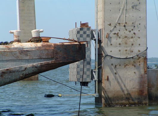 close up of barge impacting bridge pier
